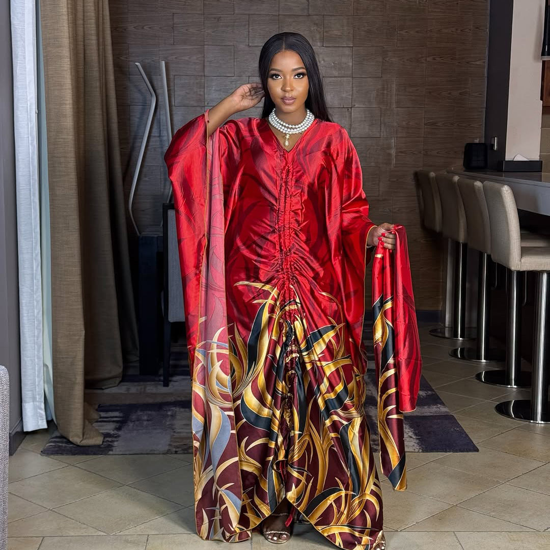 Plisowana sukienka maxi w nadruk